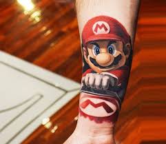 Super Mario Bros Tattoo By Ben Thomas Post 21298 Super Mario Tattoo Mario Tattoo Super Mario