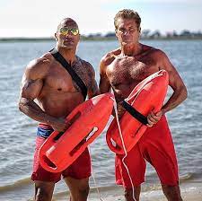 Star dwayne johnson confirmed the news with an instagram video, in which he calls 'i was born ready! pleasure to officially welcome the original #baywatch gangsta himself david hasselhoff to our movie! Baywatch Movie Dwayne The Rock Johnson David Hasselhoff Pictured Together On Set Ew Com
