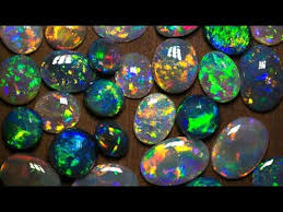Precious opal shows a play of spectral colors through the stone, whereas common opal does not. What Is Black Opal Worth The Body Tone Myth Exposed Youtube
