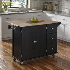 Mobile kitchen island with breakfast bar. Liberty Wood Top Mobile Kitchen Cart W Wood Or Stainless Steel Top With Black Or White Base Finish Brushed Nickel Decorative Hardware And Two Locking Castors By Dolly Madison From Home Styles