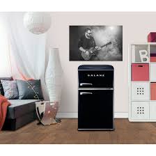 There are cabinets which are only made for storing mini fridge. Galanz Retro 3 1 Cubic Feet Cu Ft Freestanding Mini Fridge With Freezer Reviews Wayfair