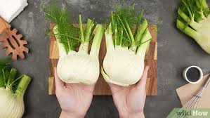Place the fennel with the cut side on board. How To Prepare Fennel To Cook 9 Steps With Pictures Wikihow