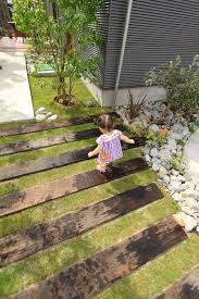 バイクを駐車できるガーデンルームのある黒ガルバの家 d s style ディーズスタイル 注文住宅 大阪 和歌山 兵庫 京都 奈良 愛知 岐阜 裏庭の造園 裏庭のデザイン エクステリア