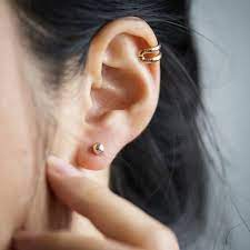 The reason being, it has a stronger, in other words empowering vibe, also, according to a survey people with upper ears piercing (helix piercing) look and sound more confident than people with lower ear piercings. What Does An Infected Ear Piercing Look Like Signs And Treatment
