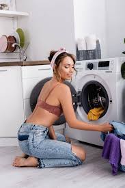 There is no campbell's cream of mushroom soup. Barefoot Housewife Sitting On Floor Near Clothes And Washing Machine In Kitchen Free Stock Photo And Image