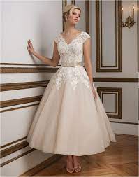 This tea length gown features a strapless neckline with a dropped waist in tulle and lace. Wedding Dresses Online Bridal Gown Stores Wedding Gowns And Their Prices 2018110 Tea Length Wedding Dress Vintage Bow Wedding Dress Wedding Dress Champagne