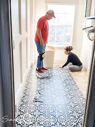 We actually did this after the cabinets and appliances were in place. How To Install Peel And Stick Vinyl Tile Over Linoleum Simply2moms