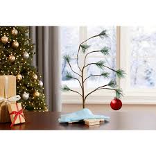 Hand made by local artisans, this little tree is made from the original molds from the 1950's. Peanuts 24 In Musical Charlie Brown Tree 14211 Mp12 The Home Depot