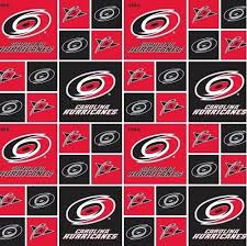 Carolina hurricanes logo by unknown author license: Cotton Fabric Sports Fabric Nhl Hockey Carolina Hurricanes Logo Squares Red And Black 4my3boyz Fabric