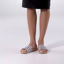 In The Early 70s Adidas Created Shower Shoes For Germany S National Football Team To Wear In Communal Locker Rooms The R Sandals Shower Shoes Mens Sandals