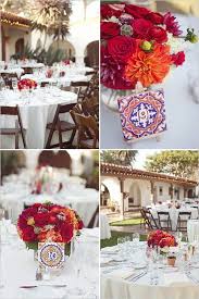 Wedding Centerpiece Floral And Mexican Spanish Tiles Red Orange Mission Mexican Themed Weddings Spanish Style Weddings Spanish Themed Weddings