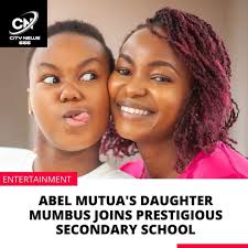 Abel Mutua and Daughter