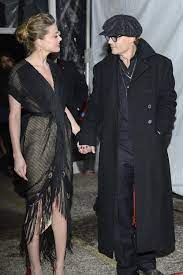 Following their very public divorce and subsequent lawsuits of domestic abuse and defamation, depp was asked to resign from warner bros.' fantastic beasts franchise.in retaliation, fans started a social media campaign to get amber heard removed from the upcoming aquaman 2, however, recent reports claim that was. Amber Heard And Johnny Depp S Pda At Texas Film Awards Popsugar Celebrity