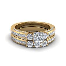 When a wedding ring just shows you're married, a matching rose gold wedding set shows the world who you married! Princess Cut Channel Set Trio Diamond Wedding Set In 14k Yellow Gold Fascinating Diamonds