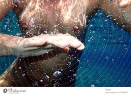 Underwater shot of a naked woman - a Royalty Free Stock Photo from Photocase