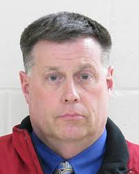 Some charges dropped in car dealership theft case