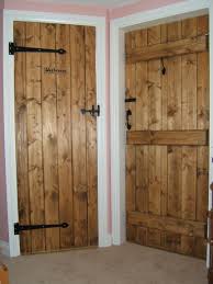 I Like The More Modern Trim With The Braced And Ledged Door I Also Like The Washroom Sign Building A Door Barn Door Designs Cottage Door