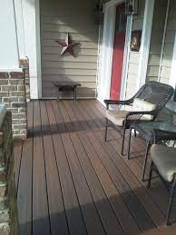 Maybe you would like to learn more about one of these? Exterior Front Porch Flooring Ideas With Dark Brown Wooden Floor Integrated With White And Grey Brick Pillars A Concrete Patio Front Porch Deck Patio Flooring