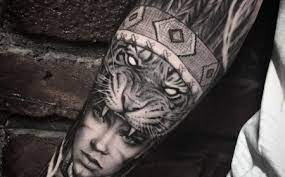 Ornamental cage decorated with cherry blossoms. 1001 Ideas And Inspirations For Cool Forearm Tattoos