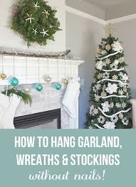I am renting and would like to hang some larger pictures on the walls without damaging the gyprock walls. Tips For How To Hang Garland Wreaths And Stockings Without Nails The Inspired Room