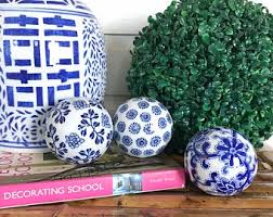 Man has actually real bochii balls (spelling unknown) and they are vintage and made of wood, nicely painted but not frivolously painted. Carpet Balls Etsy