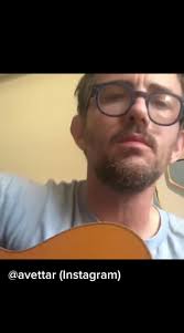 Scott Avett singing in his hotel room. Posted to his Instagram