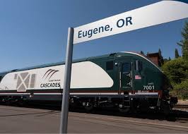 Amtrak - The new passenger train that will serve the Amtrak Cascades line  from Eugene to Vancouver, British Columbia, arrived in Eugene OR for the  first time on July 23. The new