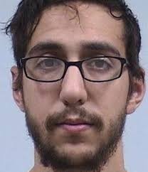 Professor killed in home invasion was stabbed dozens of times