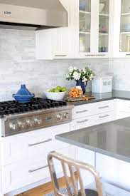 Nothing warms a kitchen quite like a stunning backsplash. 30 Lovely White Kitchen Backsplash Design Ideas Coodecor Kitchen Remodel Kitchen Design Kitchen Inspirations