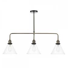 Made of a sheet of copper that has been formed, hammered. 3 Pendant Lights On A Bar Suspension In Vintage Industrial Styling