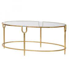 The piece features a stunning leg design finished in a beautiful dark walnut, topped with aged mirror insert. Atlantis Oval Coffee Table Kaffebord Soffbord Soffbord Guld