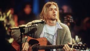 The green cardigan kurt cobain wore during nirvana's iconic mtv unplugged performance has sold at auction for $334,000 (£260,000). A Collection Of The Craziest Kurt Cobain Live Performances