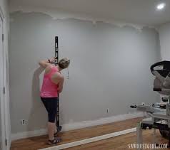Rustic planking can be anything from barn boards to pallet wood to common lumber made to look old through a finishing process. How To Install A Plank Wall Tongue And Groove Sawdust Girl