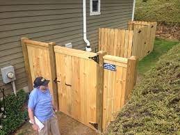 A small wooden fence gate that can be locked with a gate lock. Wood Gates Wooden Fence Gates
