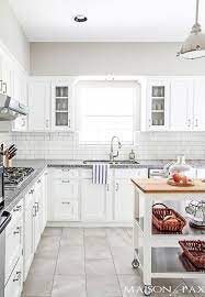 A touch of luxe with slate tiles. Paint Colour Review Colonnade Gray Vs Revere Pewter Classic White Kitchen Grey Countertops Gray And White Kitchen