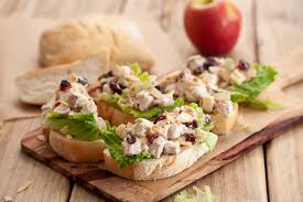 In a large bowl, toss together the romaine, tomatoes, and red onions with some of the sweet dijon vinaigrette. Top 14 Chicken Salad Recipes