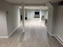 Jose G Upgraded His Basement With Kronoswiss Ecru Basement Remodel Flooring Laminate Basement Remodeling Diy Basement Basement Flooring
