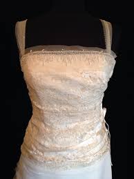 Exquisite lace and unique exclusive vintage spaghetti straps backless satin short wedding dress with pearls at waist this princess silhouette wedding dress is designed with short lace sleeves and bow on the waistline. This Website Uses Cookies To Ensure You Get The Best Experience On Our Website Learn More Got It Browse Close Menu Search Home Blog About Us Catalog See More Close Cart New Arrivals Agnes Bridal Dream Cymbeline Lusan Mandongus Pronovias