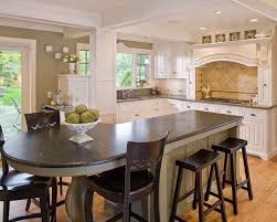 Kitchen Island Ideas With Seating The Kitchen Island Is The Ideal Location To Stabilize Round Kitchen Island Kitchen Island Table Kitchen Island With Seating