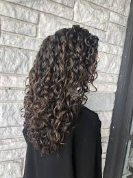Partial Honey High Lights On Dark Brown Curly Hair For A Subtle Look Curlyhair Curlygirlmeth Brown Hair Balayage Black Naturally Curly Hair Brown Curly Hair