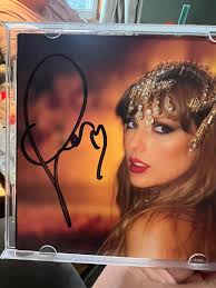 Fan buys signed item from favorite artist