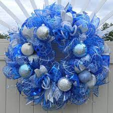 Blue and white denim ribbon and red and white check ribbon make up the bow and streamers on this wreath. Christmas Weath Blue Silver White Deco Mesh Wreath Frozen Etsy White Christmas Wreath Blue Christmas Decor Deco Mesh Christmas Wreaths