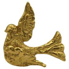 gold ysl brooch