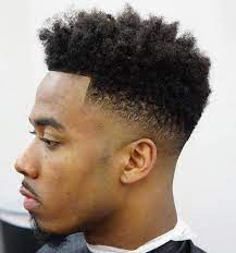 Curling afro haircut / popular curly hairstyles for black men stylendesigns / curly hair have the advantage to flaunt a range of stunning hairstyles, as is this mohawk afro url haircut, which became famous after odell beckham flaunted this haircut on several occasions. 40 Stirring Curly Hairstyles For Black Men