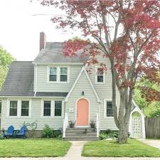 This color roof is most commonly used in colonial and victorian style houses which matches well with the white cream smoked yellow off white or beige light green classic peach. This Classic Cottage Uses Pops Of Color By Adding A Fun Peach Color To The Front D House Paint Exterior House Exterior Color Schemes New England Homes Exterior