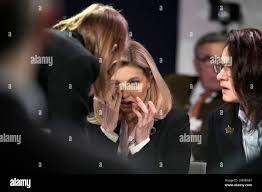 First Lady of Ukraine Olena Zelenska, center, reacts beside First Vice  Prime Minister of Ukraine Yulia Svyrydenko, right, at the World Economic  Forum in Davos, Switzerland after a helicopter crash in Ukraine,
