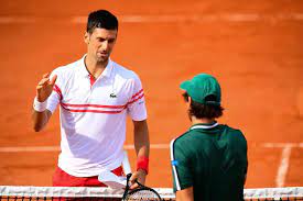 Novak djokovic celebrates with ball girls. Pk Kacnq81grlm