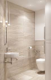 A Modern Bathroom Done In Beige And Tan And Touches Of White With Porcelain Tiles Beige Tile Bathroom Modern Bathroom Tile Modern Bathroom