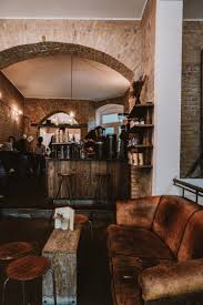 A Guide To The Best Coffee Shops In Berlin Bon Traveler Cozy Coffee Shop Coffee Shops Interior Barn Cafe