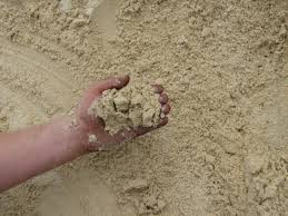 Sand is assumed relatively damp, since adding water can increase or decrease the density of the sand considerably (e.g. Masonry Sand Cumberland Md Ebyland Llc